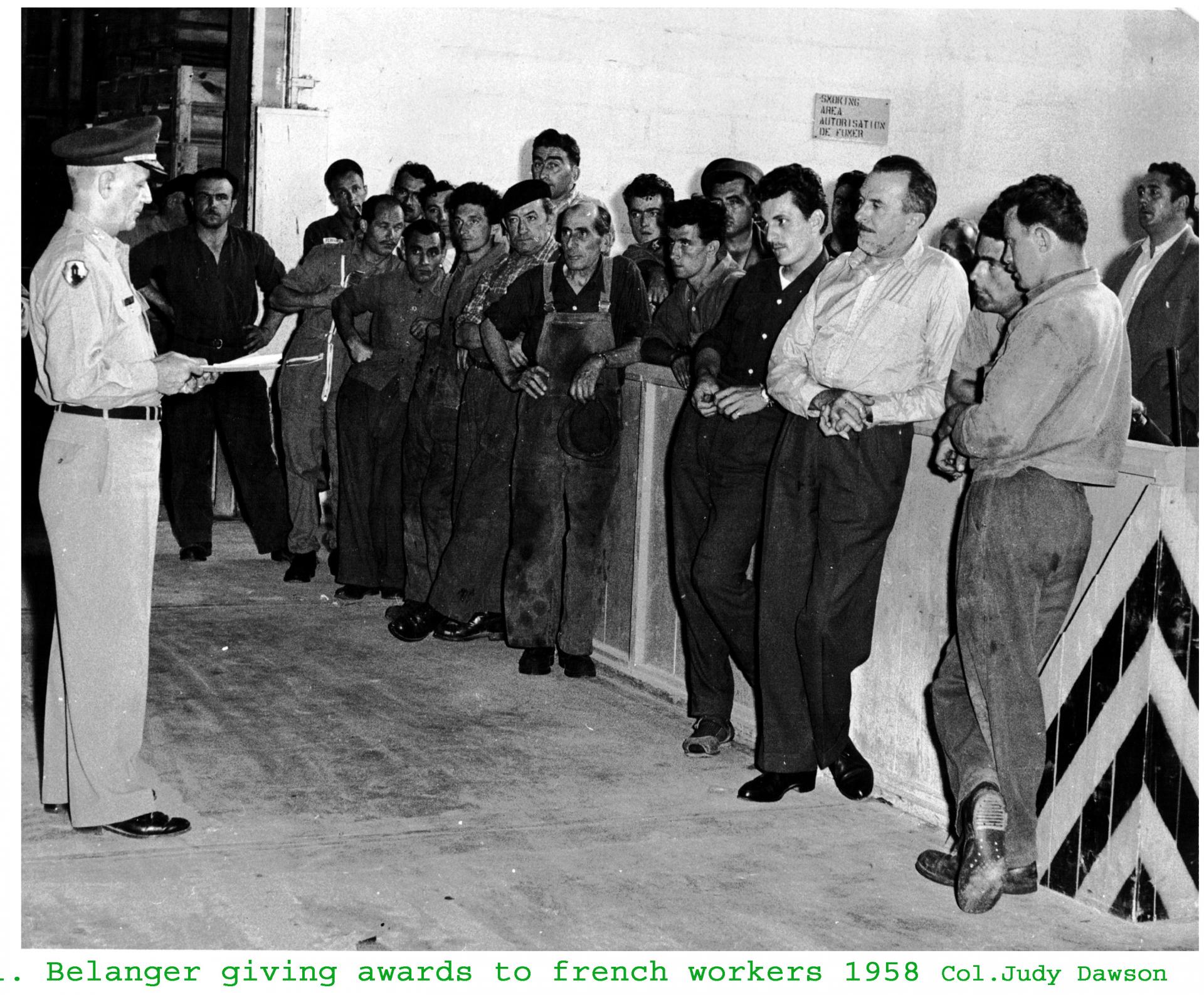 Col belanger giving awards to french workers 1958 tit